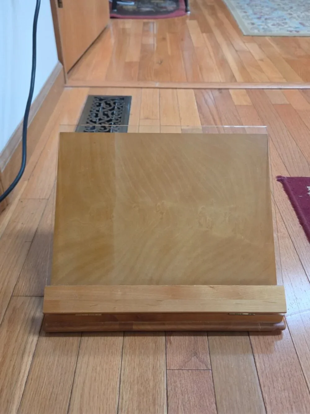 wooden cookbook stand with adjustable slant and an acrylic glass viewing shield